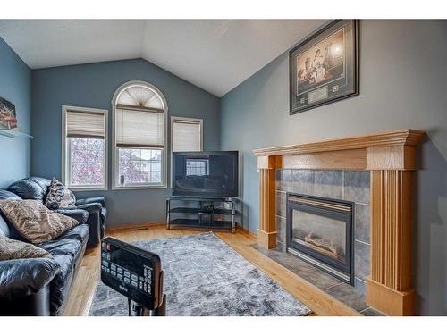 259 Coral Springs Mews Ne, Calgary, AB - Indoor Photo Showing Living Room With Fireplace