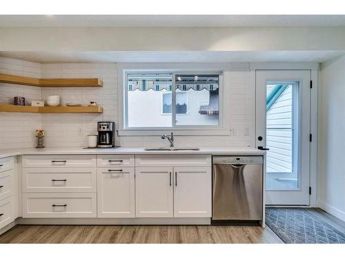 120 Willowbrook Close Nw, Airdrie, AB - Indoor Photo Showing Kitchen With Double Sink