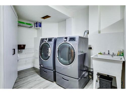 120 Willowbrook Close Nw, Airdrie, AB - Indoor Photo Showing Laundry Room