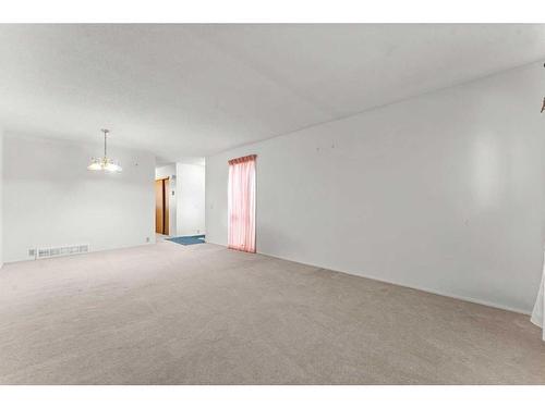 426 Cannington Close Sw, Calgary, AB - Indoor Photo Showing Other Room