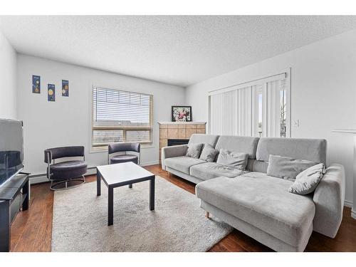 1426-60 Panatella Street Nw, Calgary, AB - Indoor Photo Showing Living Room