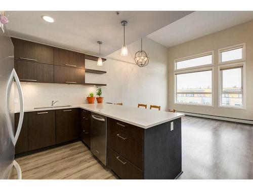 406-707 4 Street Ne, Calgary, AB - Indoor Photo Showing Kitchen With Upgraded Kitchen