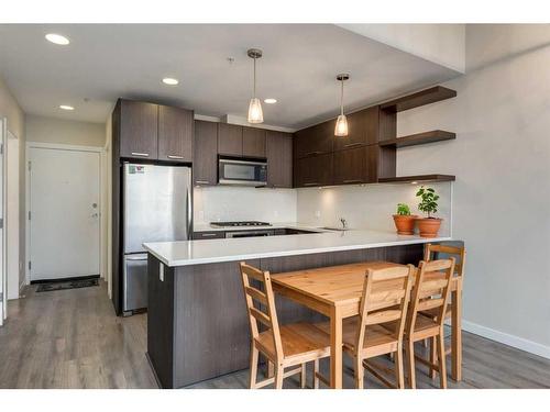 406-707 4 Street Ne, Calgary, AB - Indoor Photo Showing Kitchen With Stainless Steel Kitchen With Upgraded Kitchen