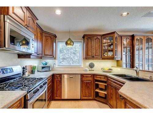 258 Shawnessy Drive Sw, Calgary, AB - Indoor Photo Showing Kitchen With Double Sink