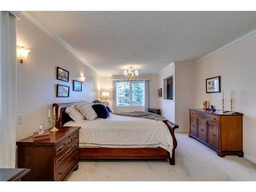 258 Shawnessy Drive Sw, Calgary, AB - Indoor Photo Showing Bedroom