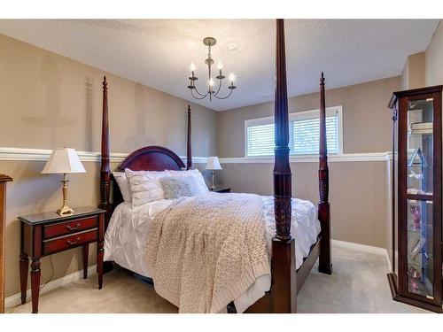 258 Shawnessy Drive Sw, Calgary, AB - Indoor Photo Showing Bedroom