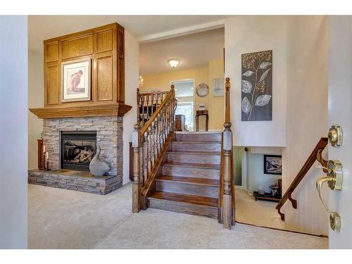 258 Shawnessy Drive Sw, Calgary, AB - Indoor Photo Showing Other Room With Fireplace