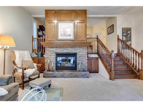 258 Shawnessy Drive Sw, Calgary, AB - Indoor Photo Showing Living Room With Fireplace