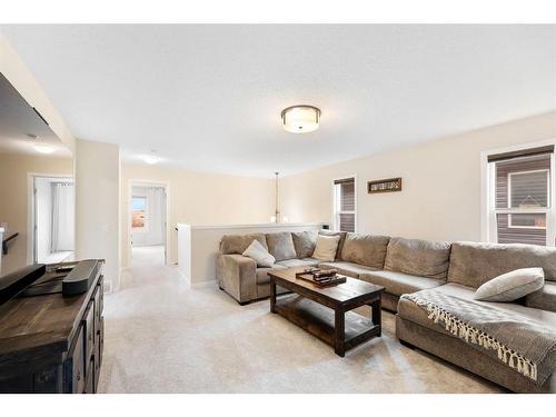 85 Fireside Circle, Cochrane, AB - Indoor Photo Showing Living Room