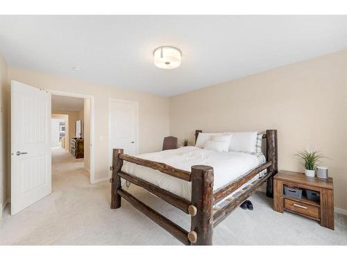 85 Fireside Circle, Cochrane, AB - Indoor Photo Showing Bedroom