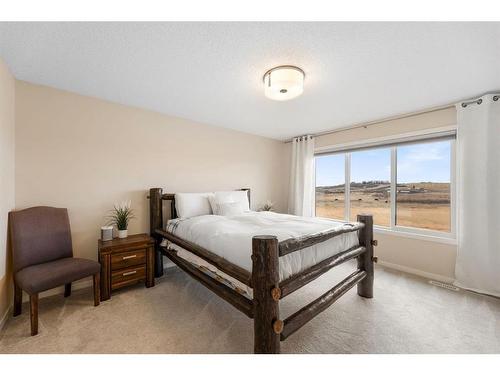 85 Fireside Circle, Cochrane, AB - Indoor Photo Showing Bedroom