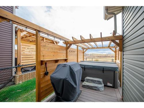 85 Fireside Circle, Cochrane, AB - Outdoor With Deck Patio Veranda With Exterior