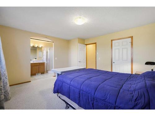 99 Eversyde Circle Sw, Calgary, AB - Indoor Photo Showing Bedroom