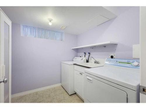 99 Eversyde Circle Sw, Calgary, AB - Indoor Photo Showing Laundry Room