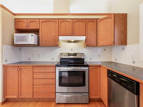 99 Eversyde Circle Sw, Calgary, AB - Indoor Photo Showing Kitchen