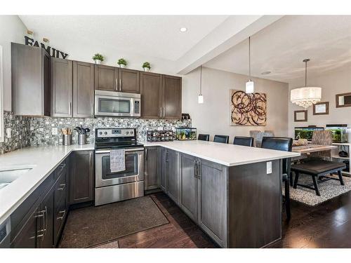 41 Copperpond Avenue Se, Calgary, AB - Indoor Photo Showing Kitchen With Stainless Steel Kitchen With Upgraded Kitchen