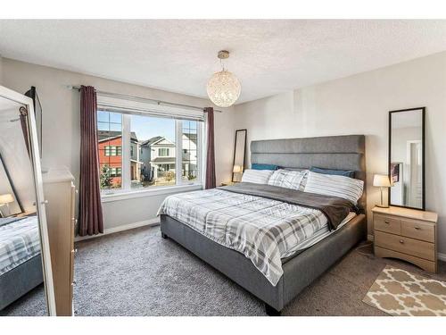 41 Copperpond Avenue Se, Calgary, AB - Indoor Photo Showing Bedroom