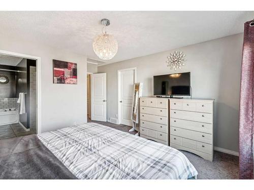 41 Copperpond Avenue Se, Calgary, AB - Indoor Photo Showing Bedroom