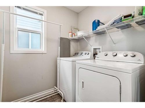 41 Copperpond Avenue Se, Calgary, AB - Indoor Photo Showing Laundry Room