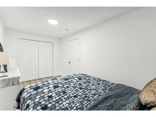 41 Copperpond Avenue Se, Calgary, AB - Indoor Photo Showing Bedroom