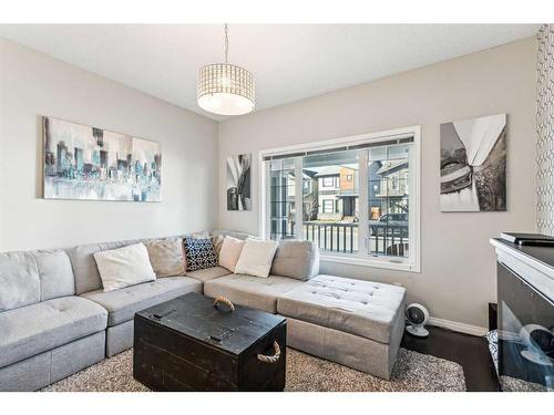 41 Copperpond Avenue Se, Calgary, AB - Indoor Photo Showing Living Room