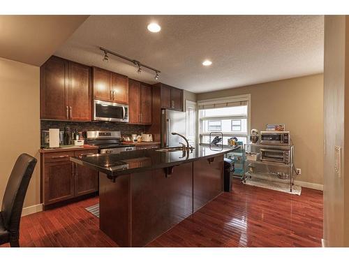 209 Aspen Hills Villas Sw, Calgary, AB - Indoor Photo Showing Kitchen