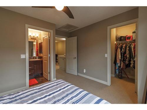 209 Aspen Hills Villas Sw, Calgary, AB - Indoor Photo Showing Bedroom