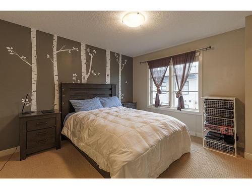 209 Aspen Hills Villas Sw, Calgary, AB - Indoor Photo Showing Bedroom