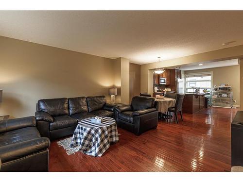 209 Aspen Hills Villas Sw, Calgary, AB - Indoor Photo Showing Living Room