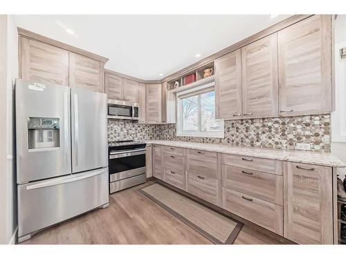 144 Fairview Drive Se, Calgary, AB - Indoor Photo Showing Kitchen With Upgraded Kitchen