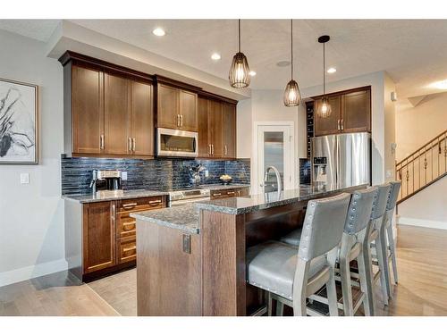 222 Aspen Stone Way Sw, Calgary, AB - Indoor Photo Showing Kitchen With Upgraded Kitchen