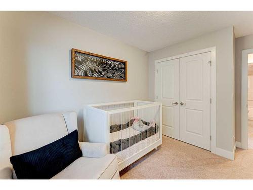 222 Aspen Stone Way Sw, Calgary, AB - Indoor Photo Showing Bedroom