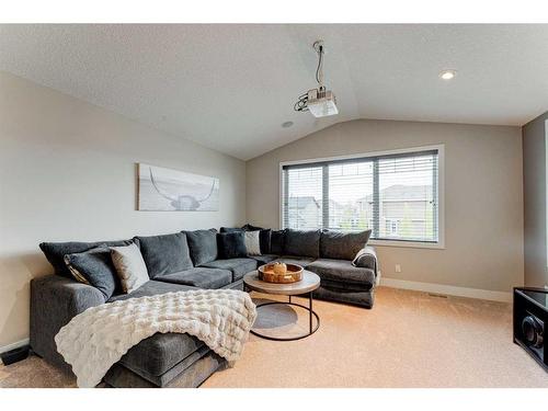 222 Aspen Stone Way Sw, Calgary, AB - Indoor Photo Showing Living Room