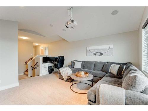 222 Aspen Stone Way Sw, Calgary, AB - Indoor Photo Showing Living Room