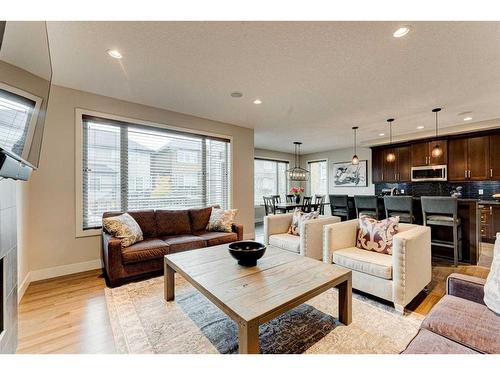 222 Aspen Stone Way Sw, Calgary, AB - Indoor Photo Showing Living Room