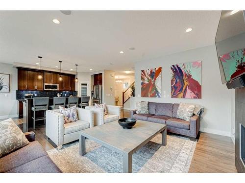 222 Aspen Stone Way Sw, Calgary, AB - Indoor Photo Showing Living Room