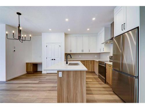 109 5 Avenue Se, High River, AB - Indoor Photo Showing Kitchen With Double Sink With Upgraded Kitchen