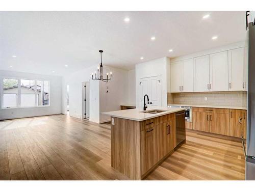 109 5 Avenue Se, High River, AB - Indoor Photo Showing Kitchen With Double Sink With Upgraded Kitchen