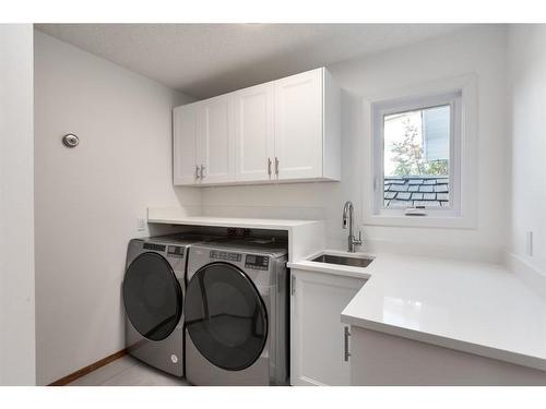 523 Woodbriar Place Sw, Calgary, AB - Indoor Photo Showing Laundry Room