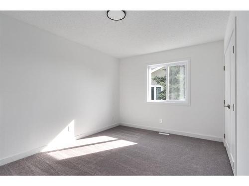 523 Woodbriar Place Sw, Calgary, AB - Indoor Photo Showing Other Room