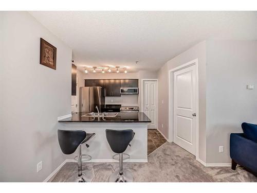 319-195 Kincora Glen Road Nw, Calgary, AB - Indoor Photo Showing Kitchen