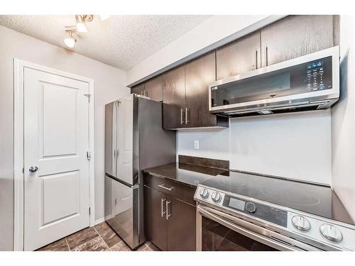 319-195 Kincora Glen Road Nw, Calgary, AB - Indoor Photo Showing Kitchen