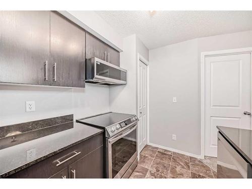 319-195 Kincora Glen Road Nw, Calgary, AB - Indoor Photo Showing Kitchen