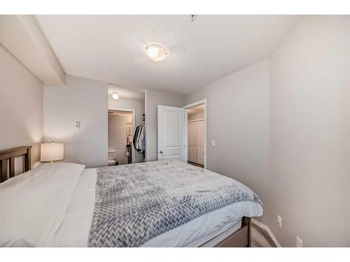 319-195 Kincora Glen Road Nw, Calgary, AB - Indoor Photo Showing Bedroom