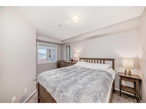 319-195 Kincora Glen Road Nw, Calgary, AB - Indoor Photo Showing Bedroom