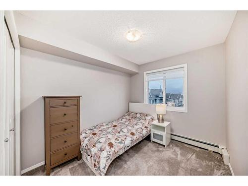 319-195 Kincora Glen Road Nw, Calgary, AB - Indoor Photo Showing Bedroom