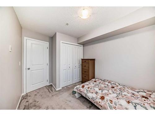 319-195 Kincora Glen Road Nw, Calgary, AB - Indoor Photo Showing Bedroom