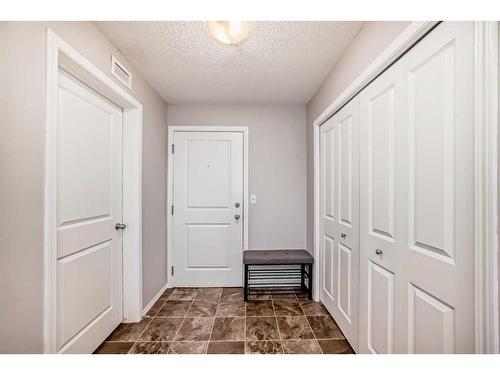 319-195 Kincora Glen Road Nw, Calgary, AB - Indoor Photo Showing Other Room