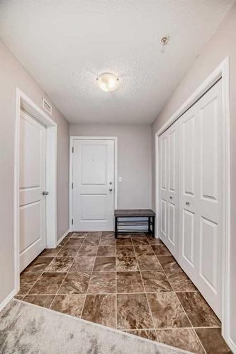 319-195 Kincora Glen Road Nw, Calgary, AB - Indoor Photo Showing Other Room