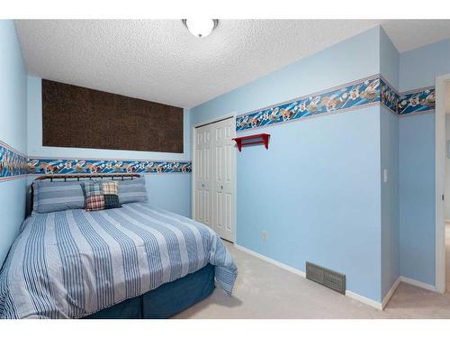 71 Edcath Road Nw, Calgary, AB - Indoor Photo Showing Bedroom